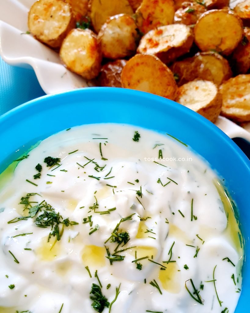 Tzatziki served with Sriracha Potatoes