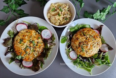 Air Fryer Stuffed Mushrooms served in plates with greens and red radish in the side and the filling of mashed potato in a bowl